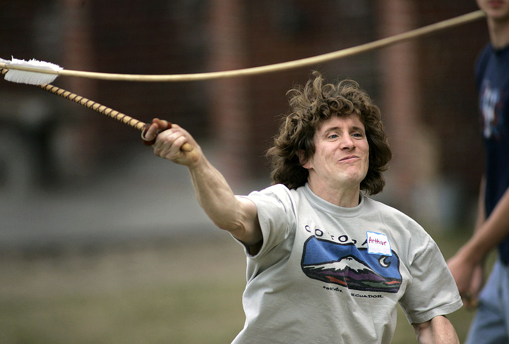 Staff Photo by Derek Davis, Saturday, April 22, 2006: Arthur Haines of Maine Primitive Skills School in Augusta throws a dart with an atlatl, a tool used to give leverage, during a demonstration at University of Southern Maine in Gorham.  (Photo by Gregory Rec/Portland Press Herald via Getty Images)